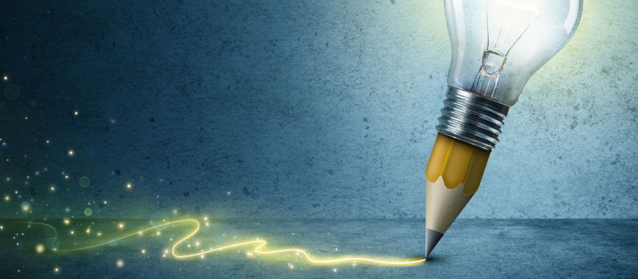 Short pencil with light bulb topper writing a glowing, sparkling yellow line
