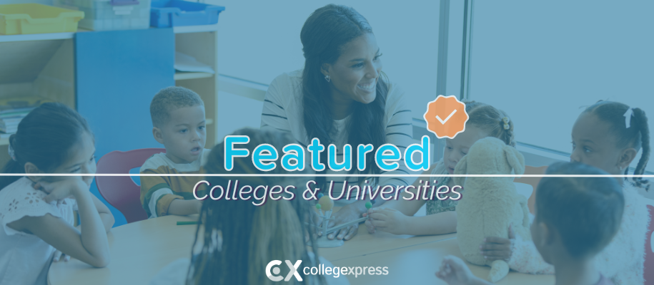 Black woman in striped shirt sits with preschool students, featured schools logo