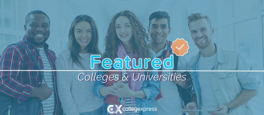 5 diverse students smile at camera in glass window hall, featured schools logo