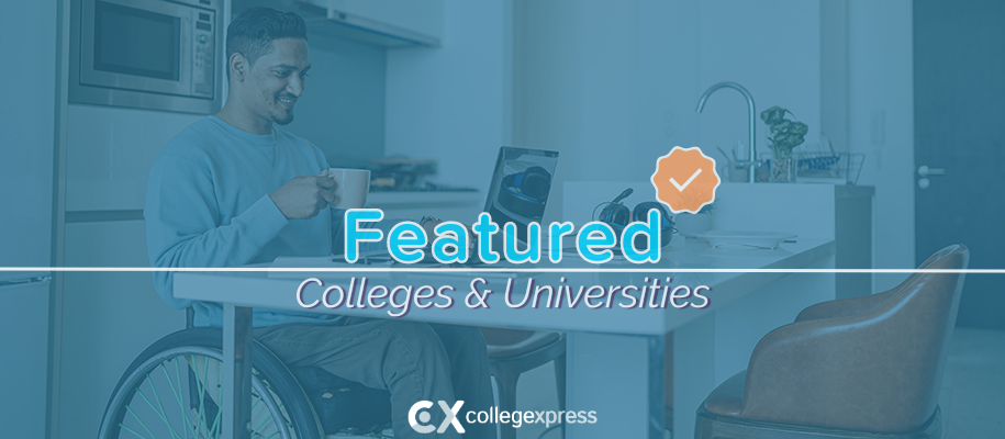 Hispanic man in wheelchair with coffee, laptop in kitchen, featured schools logo