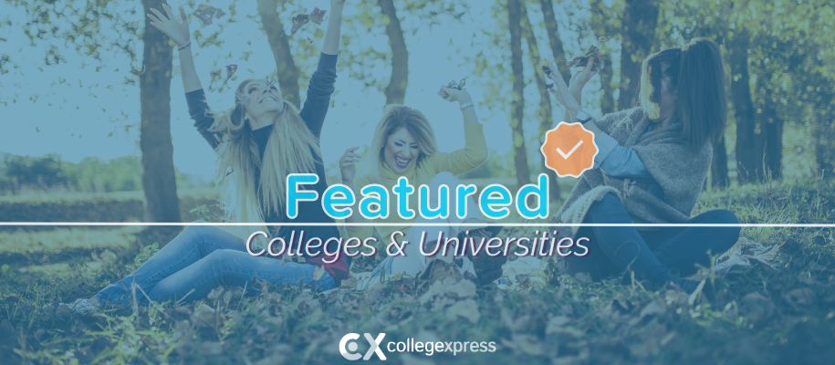 2 White women in park throwing leaves in air and laughing, featured schools logo