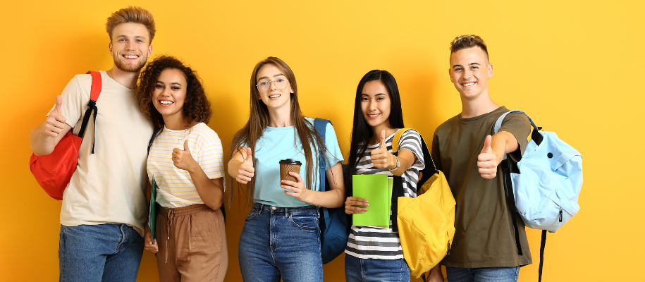 Five diverse students on yellow background with backpacks giving thumbs up