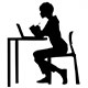 Silhouette icon of person at desk with laptop