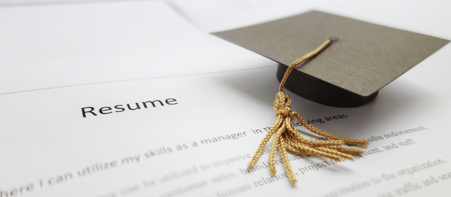 A tiny mortar board on top of a page titled resume