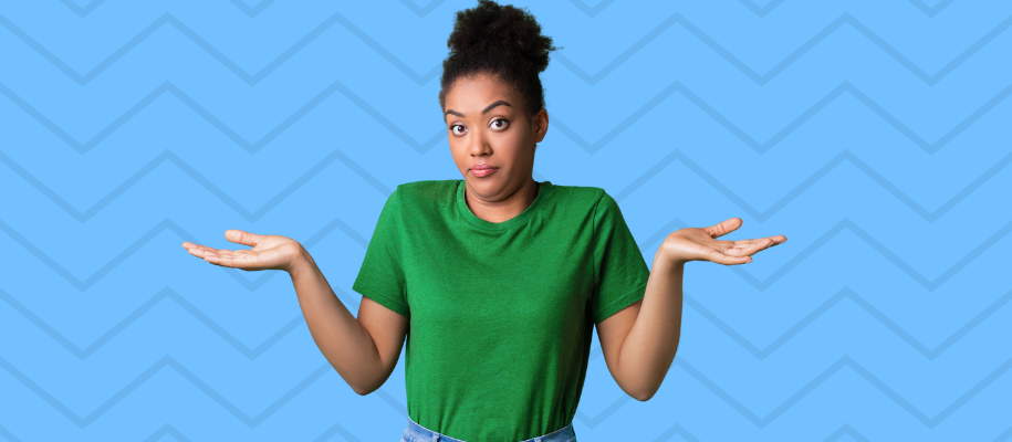 Young black teenage girl with bun and green shirt, shrugging with hands up