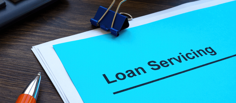 Blue paper with "loan servicing" across the top