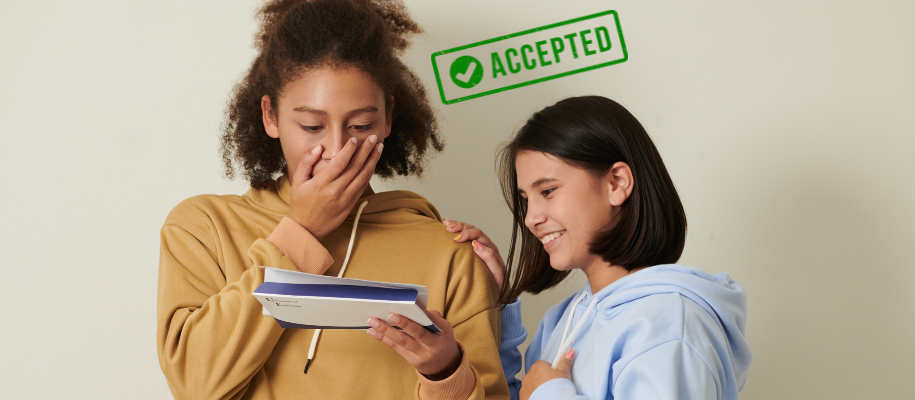 Black girl with hand over mouth and college acceptance letter and friend nearby