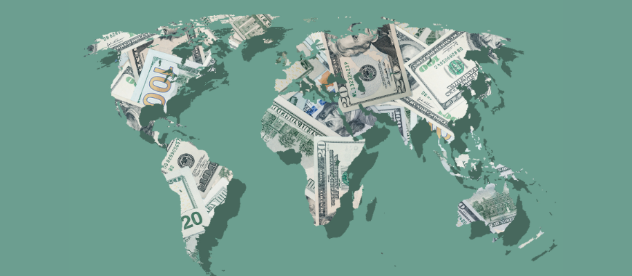 World map made out of US money on pine green background