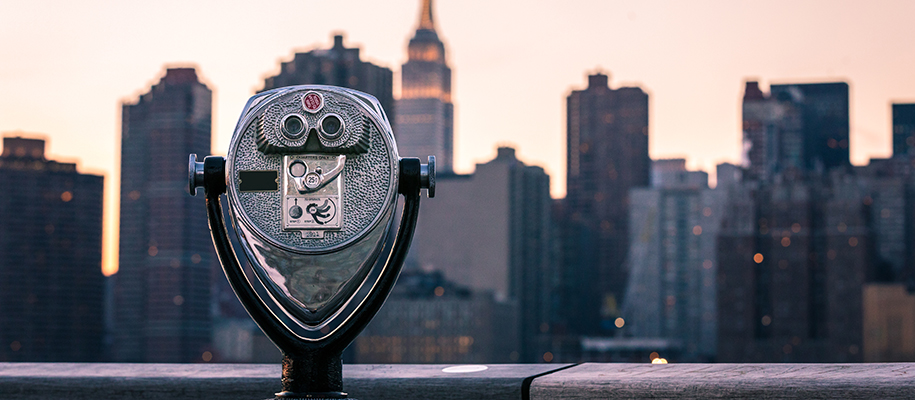 Riverside binocular machine pointing toward New York city skyline