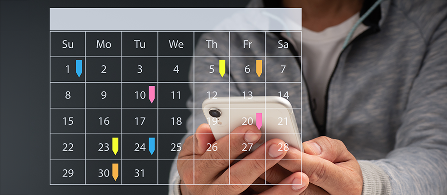 Body of Black man holds white phone in hands with event-filled calendar overlay